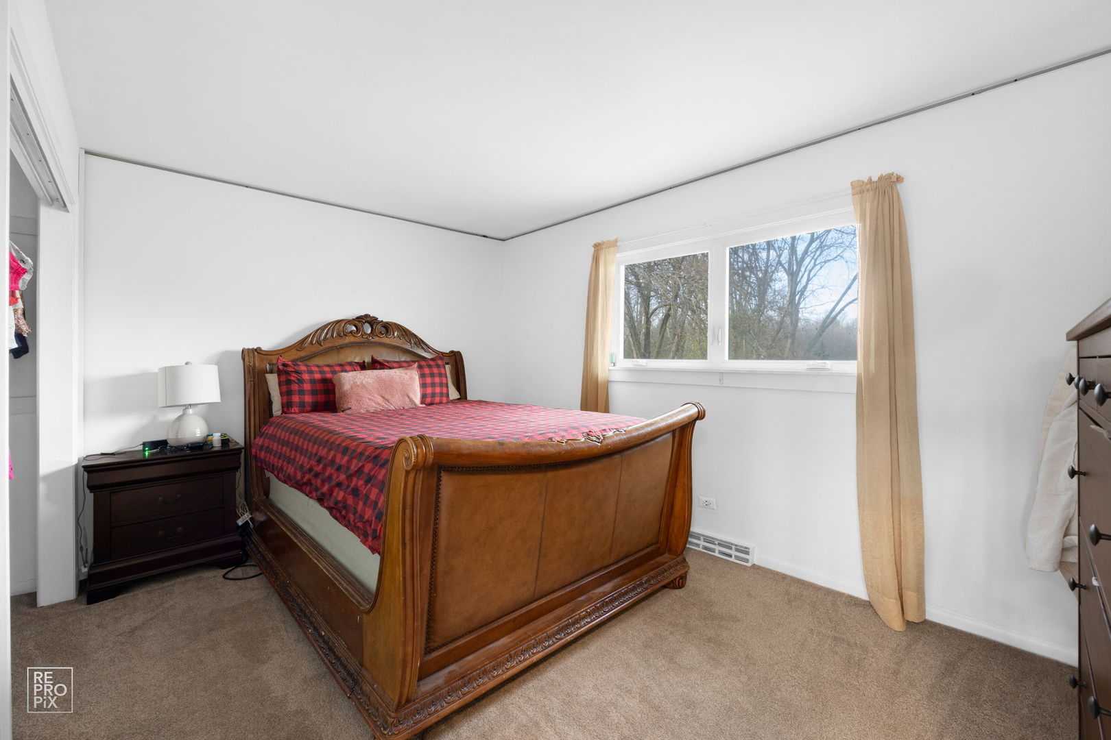362 63rd Street Willowbrook, IL 60527 - Photo 18 of 25 a bedroom with a bed and a window