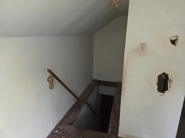 a kitchen with a sink and a stove