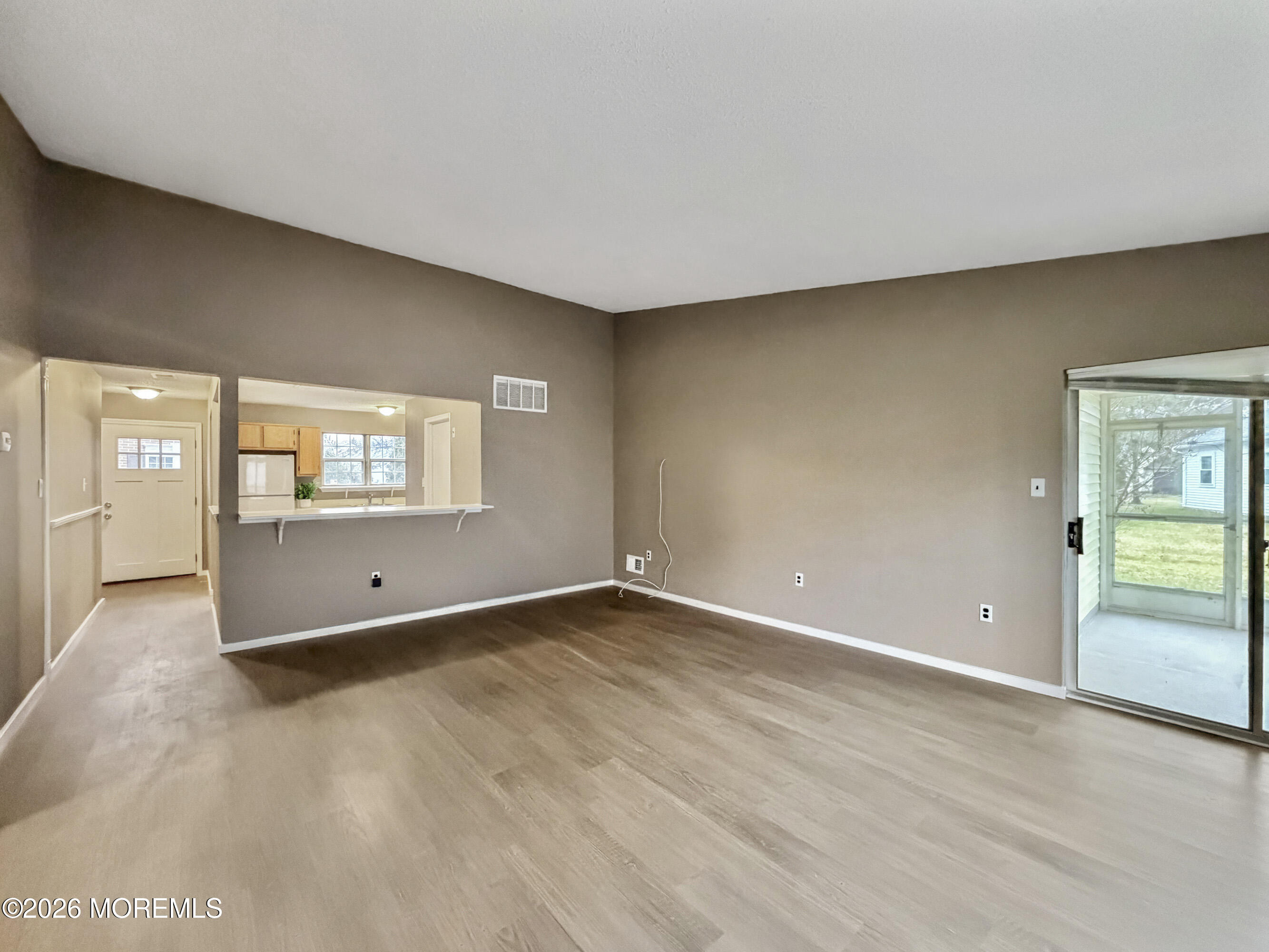 47 Carnaby Close Freehold, NJ 07728 - Photo 11 of 29 a view of an empty room with a window