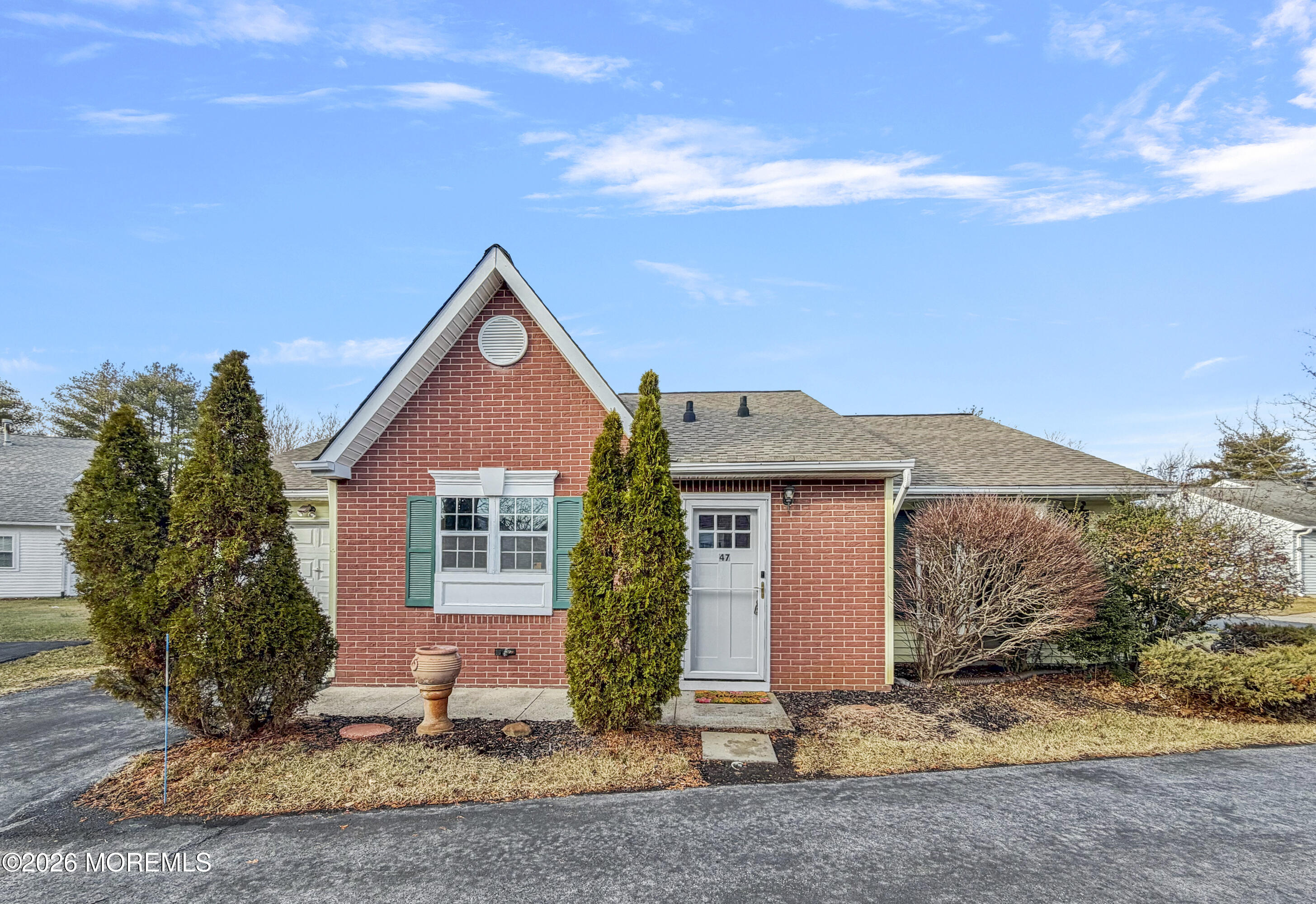 47 Carnaby Close Freehold, NJ 07728 - Photo 26 of 29 a front view of a house with garden
