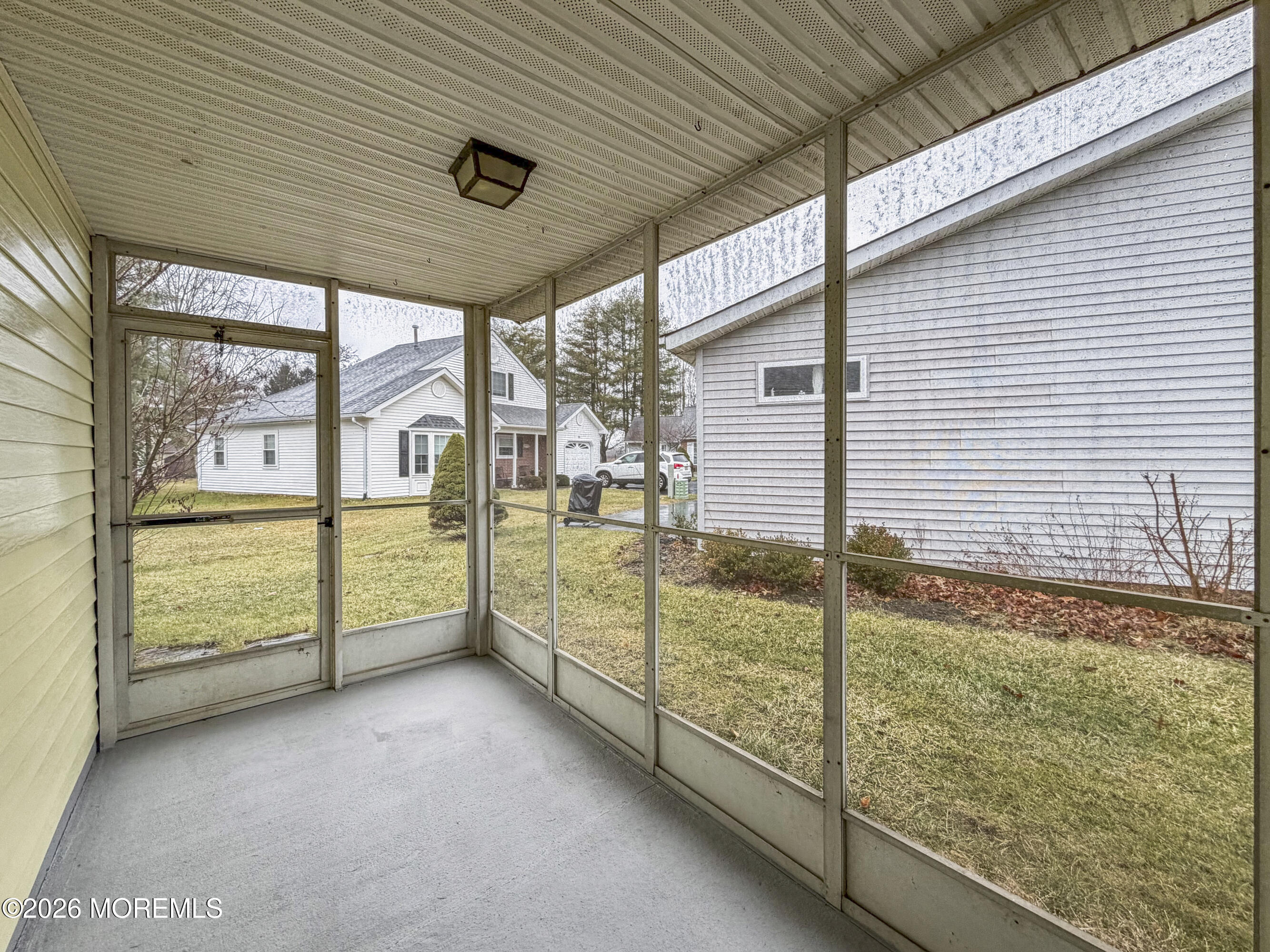 47 Carnaby Close Freehold, NJ 07728 - Photo 27 of 29 Enclosed Sunroom