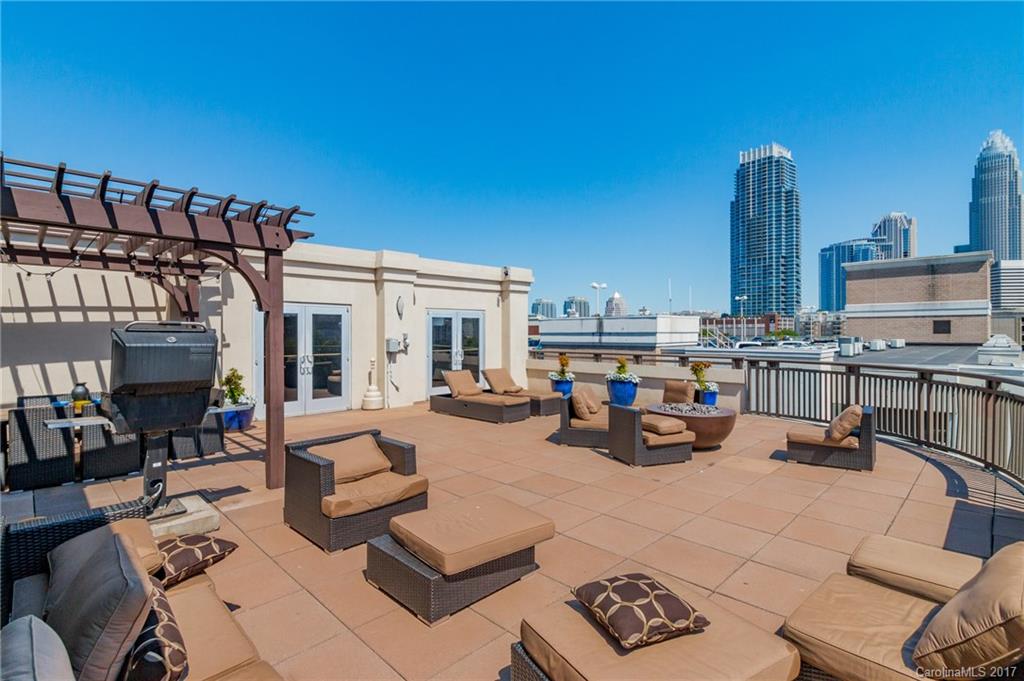 718 West Trade Street, Unit 211 Charlotte, NC 28202 - Photo 17 of 24 a view of a terrace with seating area