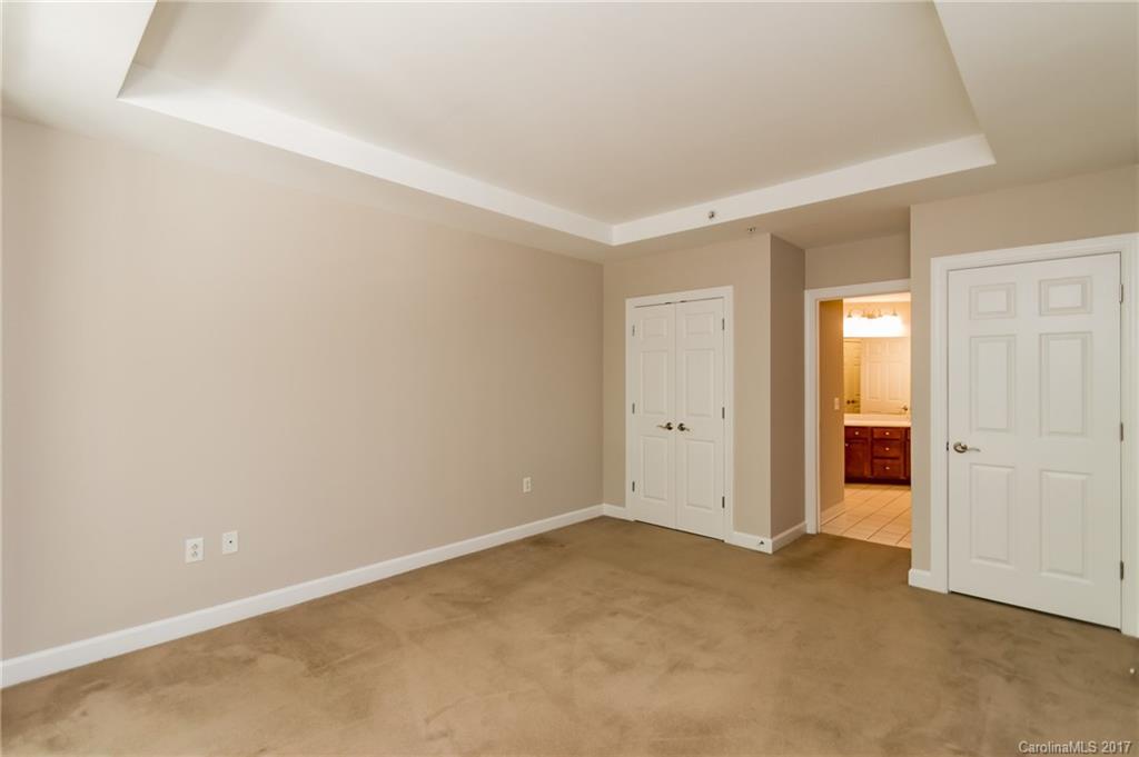 718 West Trade Street, Unit 211 Charlotte, NC 28202 - Photo 10 of 24 a view of an empty room