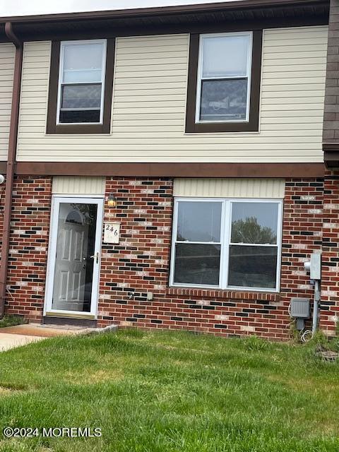 246 Greenwood Loop Road Brick, NJ 08724 - Photo 1 of 15 a view of a brick house with a large window