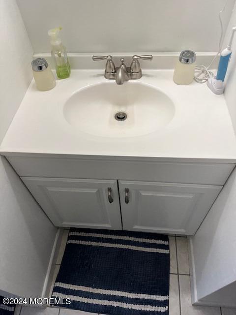 246 Greenwood Loop Road Brick, NJ 08724 - Photo 13 of 15 a bathroom with a sink and a mirror