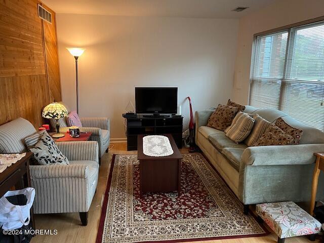 246 Greenwood Loop Road Brick, NJ 08724 - Photo 3 of 15 a living room with furniture and a couch