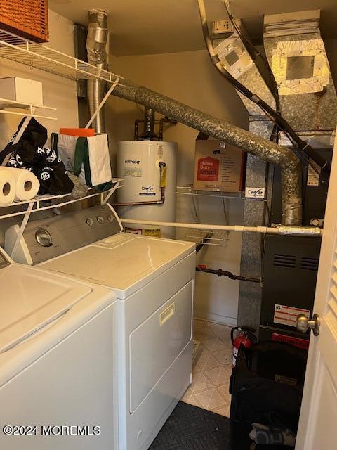 246 Greenwood Loop Road Brick, NJ 08724 - Photo 8 of 15 a utility room with dryer and washer