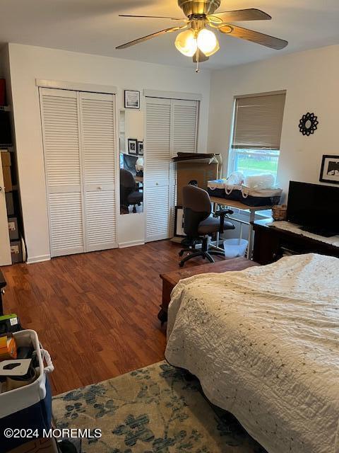 246 Greenwood Loop Road Brick, NJ 08724 - Photo 10 of 15 a bedroom with a bed and a chandelier