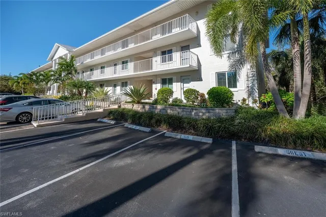 a front view of building with yard