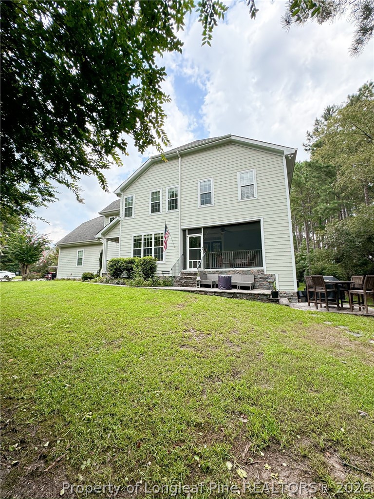 93 Falcon Ridge Drive Spring Lake, NC 28390 - Photo 46 of 50 a front view of house with yard and trees