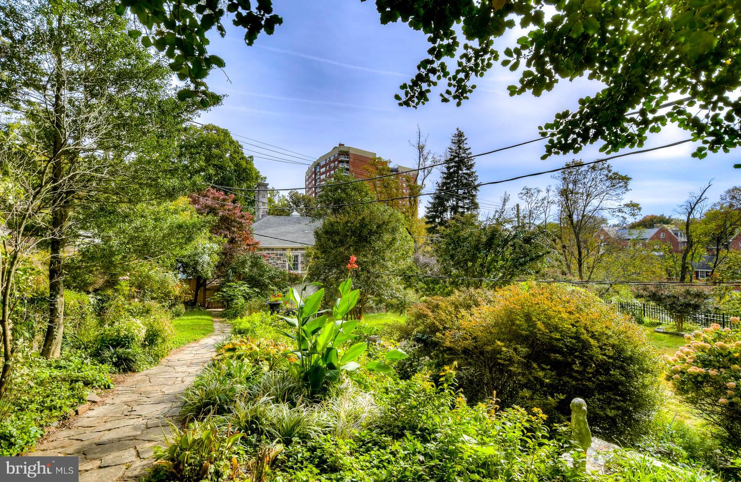 310 Ridgemede Road, Unit 203 Baltimore, MD 21210 - Photo 3 of 18 a view of a garden