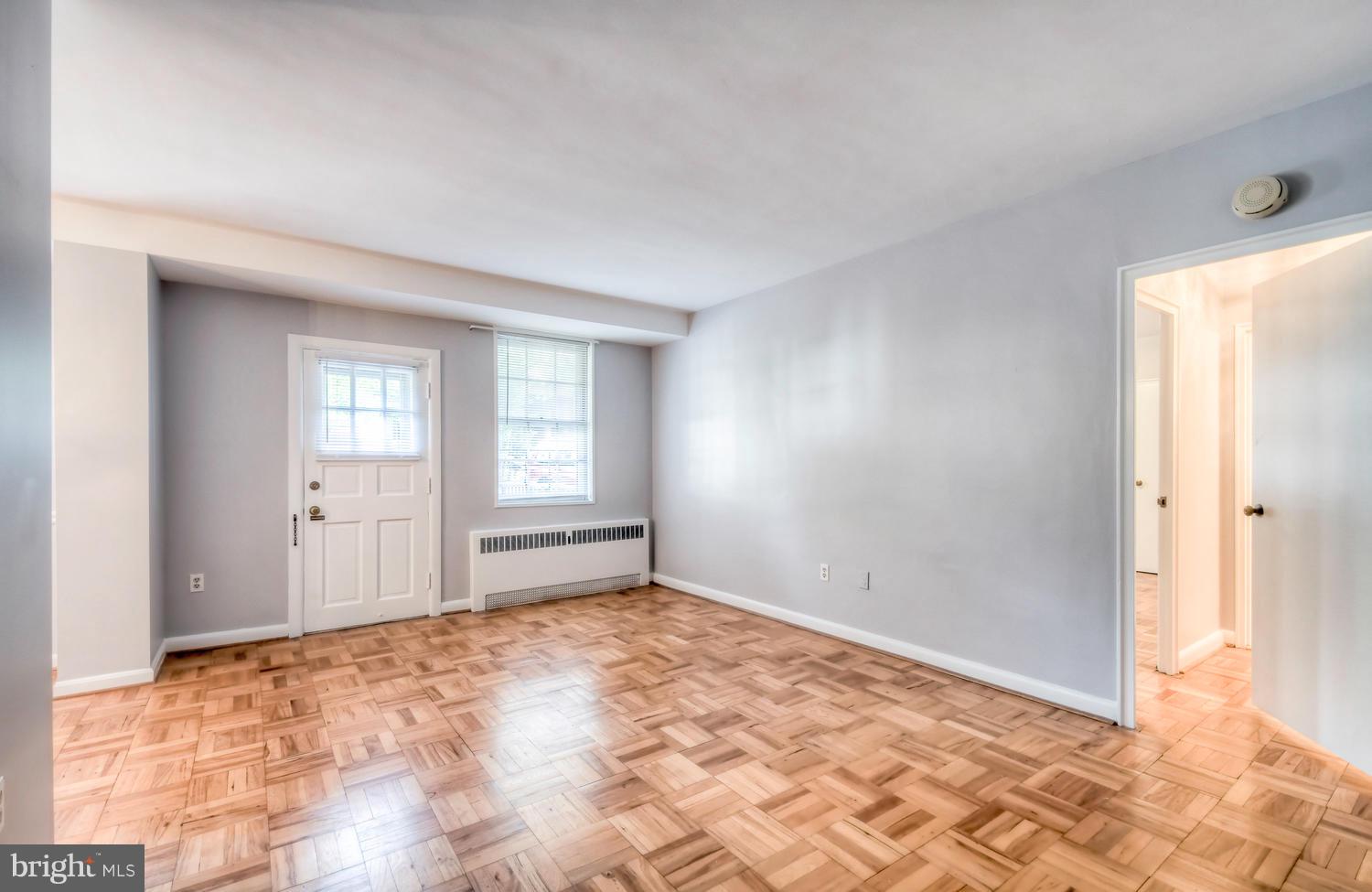 310 Ridgemede Road, Unit 203 Baltimore, MD 21210 - Photo 7 of 18 a view of an empty room and window