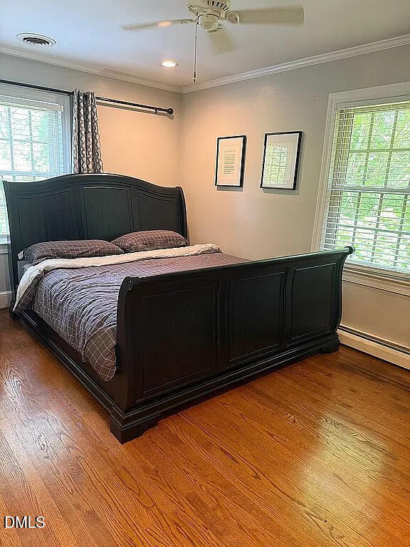 240 Crestwood Drive Roxboro, NC 27573 - Photo 14 of 25 a bedroom with a bed dresser and a window