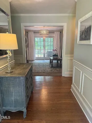 a kitchen with granite countertop a sink stove and cabinets