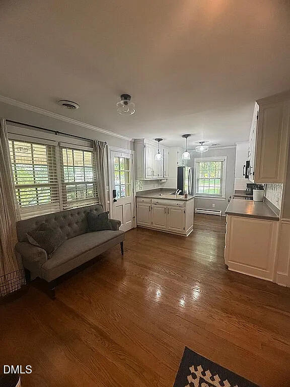 240 Crestwood Drive Roxboro, NC 27573 - Photo 7 of 25 a living room with furniture and a large window