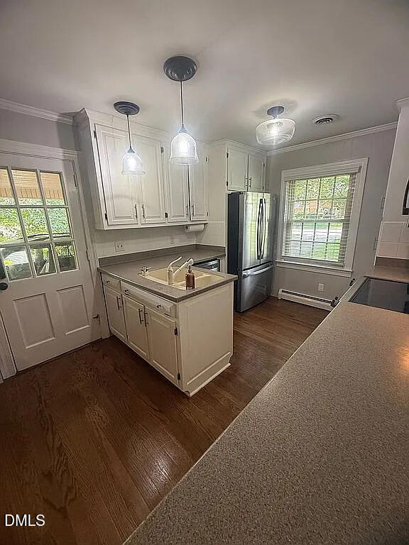240 Crestwood Drive Roxboro, NC 27573 - Photo 8 of 25 a kitchen with stainless steel appliances granite countertop a sink a stove and a refrigerator