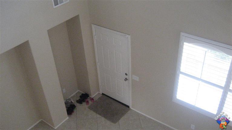 44741 Ruthron Avenue Lancaster, CA 93536 - Photo 17 of 18 a room that has a window in it