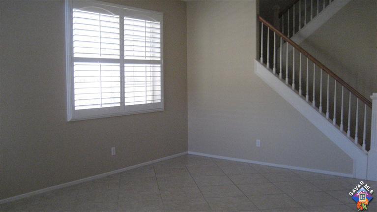 44741 Ruthron Avenue Lancaster, CA 93536 - Photo 6 of 18 an empty room with windows