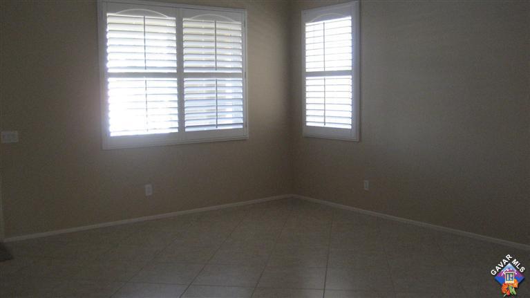44741 Ruthron Avenue Lancaster, CA 93536 - Photo 7 of 18 an empty room with a window