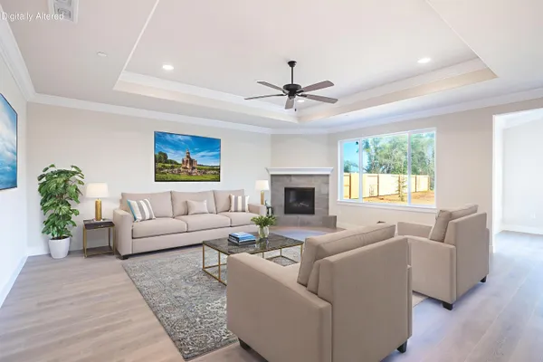 a living room with furniture and a fireplace