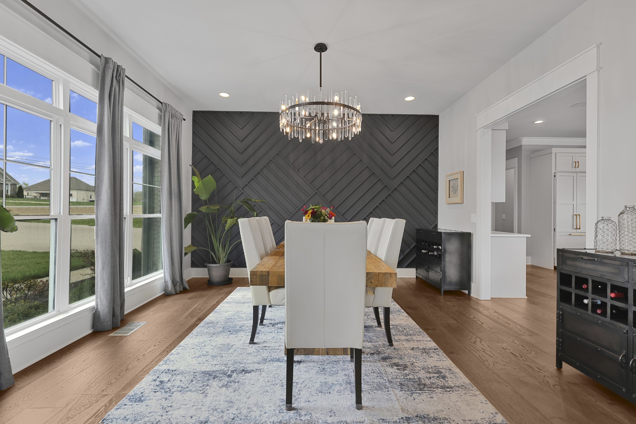 617 Cole's Ferry Road Gallatin, TN 37066 - Photo 5 of 50 a dining room filled chandelier and wooden floor