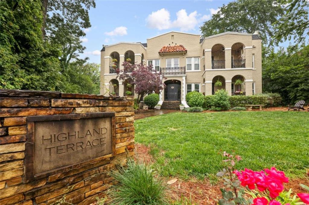 856 Briarcliff Road Northeast, Unit 15 Atlanta, GA 30306 - Photo 1 of 1 a front view of a house with garden