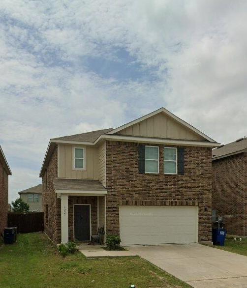 6223 Old Bridge Way Forney, TX 75126 - Photo 1 of 1 Two-story residence featuring a brick and siding exterior
