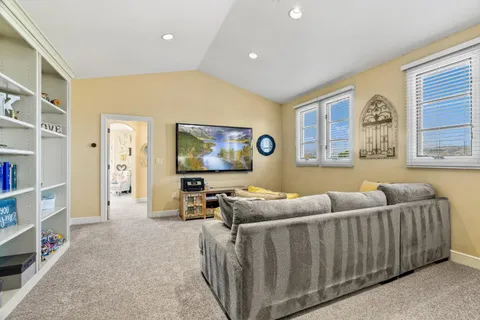 a view of a patio with a table and chairs