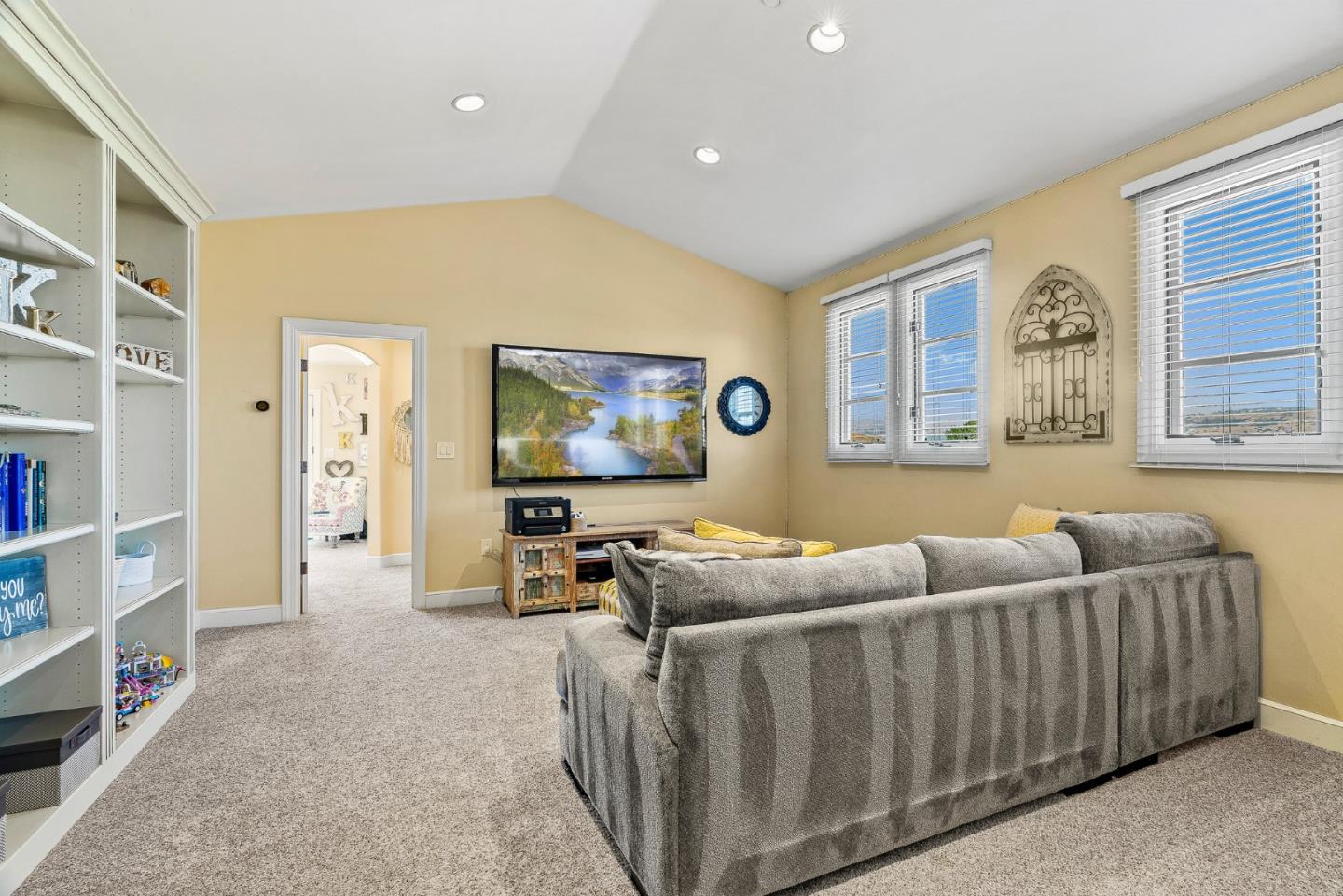 1405 Lakeview Court San Martin, CA 95046 - Photo 32 of 83 a living room with furniture and a flat screen tv