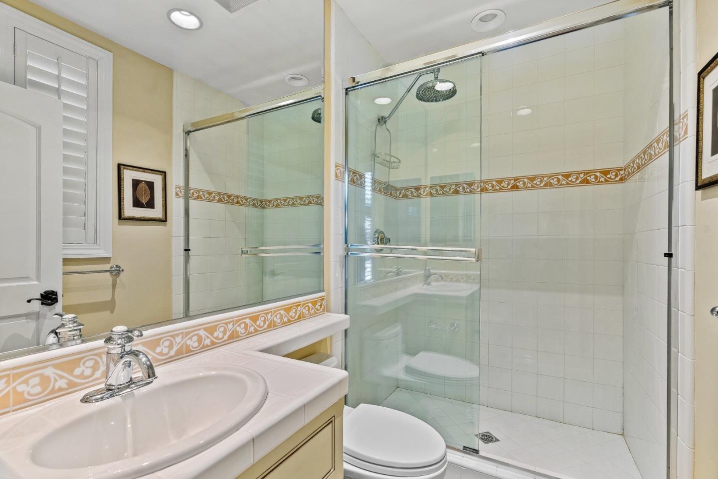 1405 Lakeview Court San Martin, CA 95046 - Photo 35 of 83 a bathroom with a sink shower and a mirror