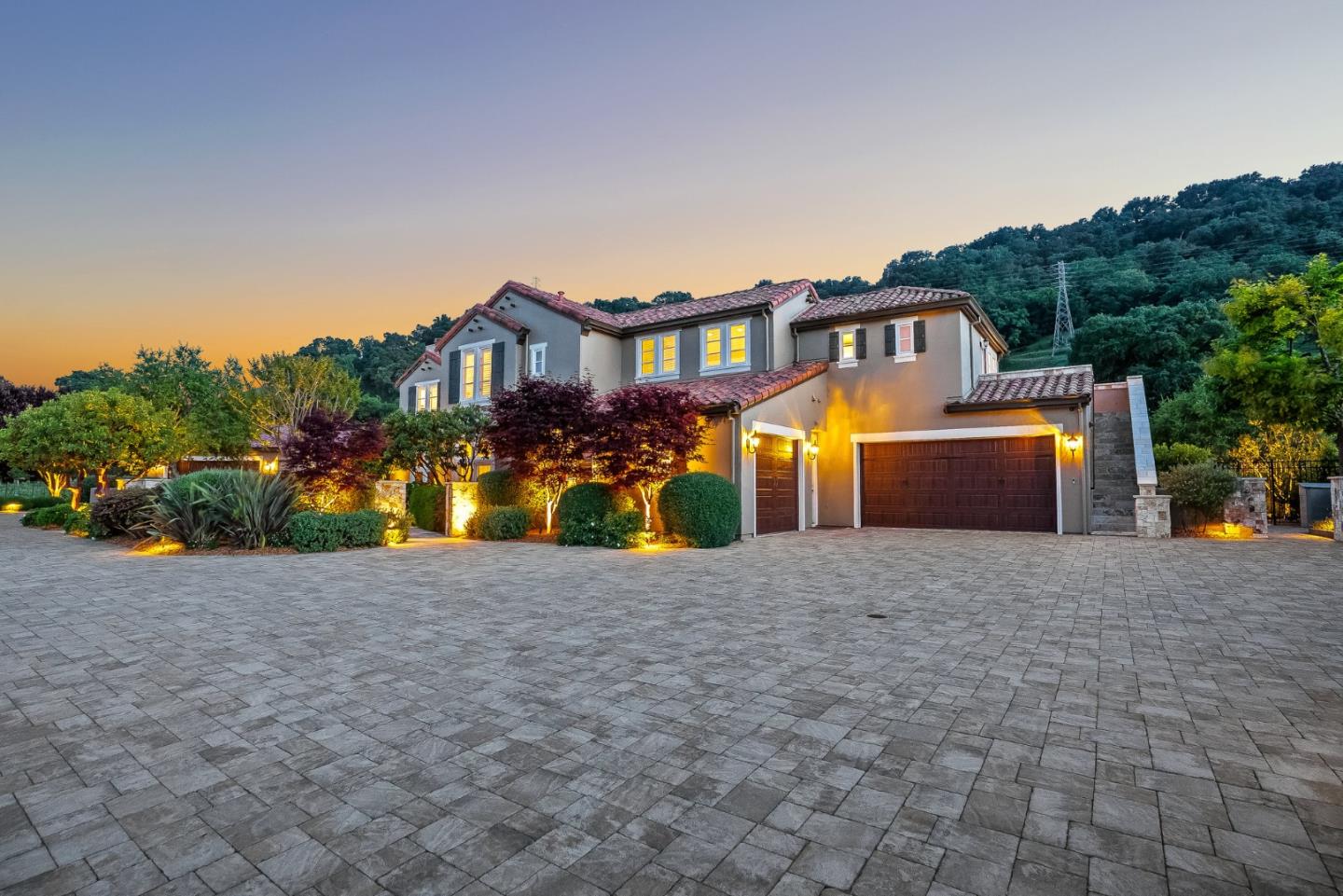 1405 Lakeview Court San Martin, CA 95046 - Photo 4 of 83 a front view of a house with a yard and a large tree