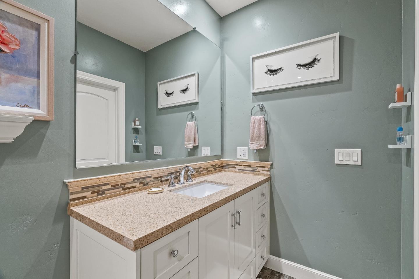 1405 Lakeview Court San Martin, CA 95046 - Photo 41 of 83 a bathroom with a sink vanity and a mirror