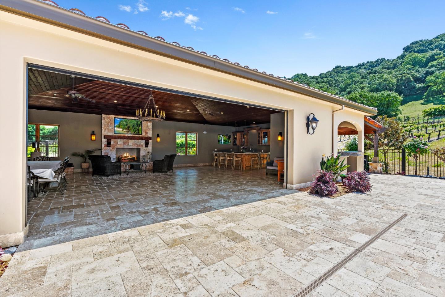 1405 Lakeview Court San Martin, CA 95046 - Photo 46 of 83 a view of a patio with a table and chairs under an umbrella