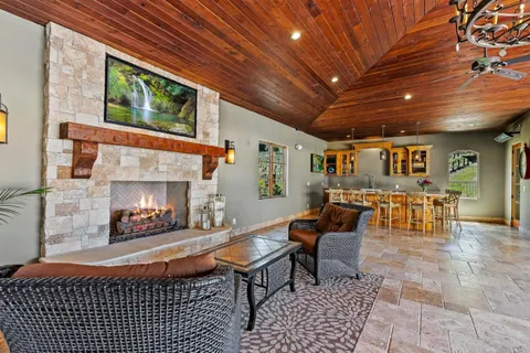 a view of balcony with furniture