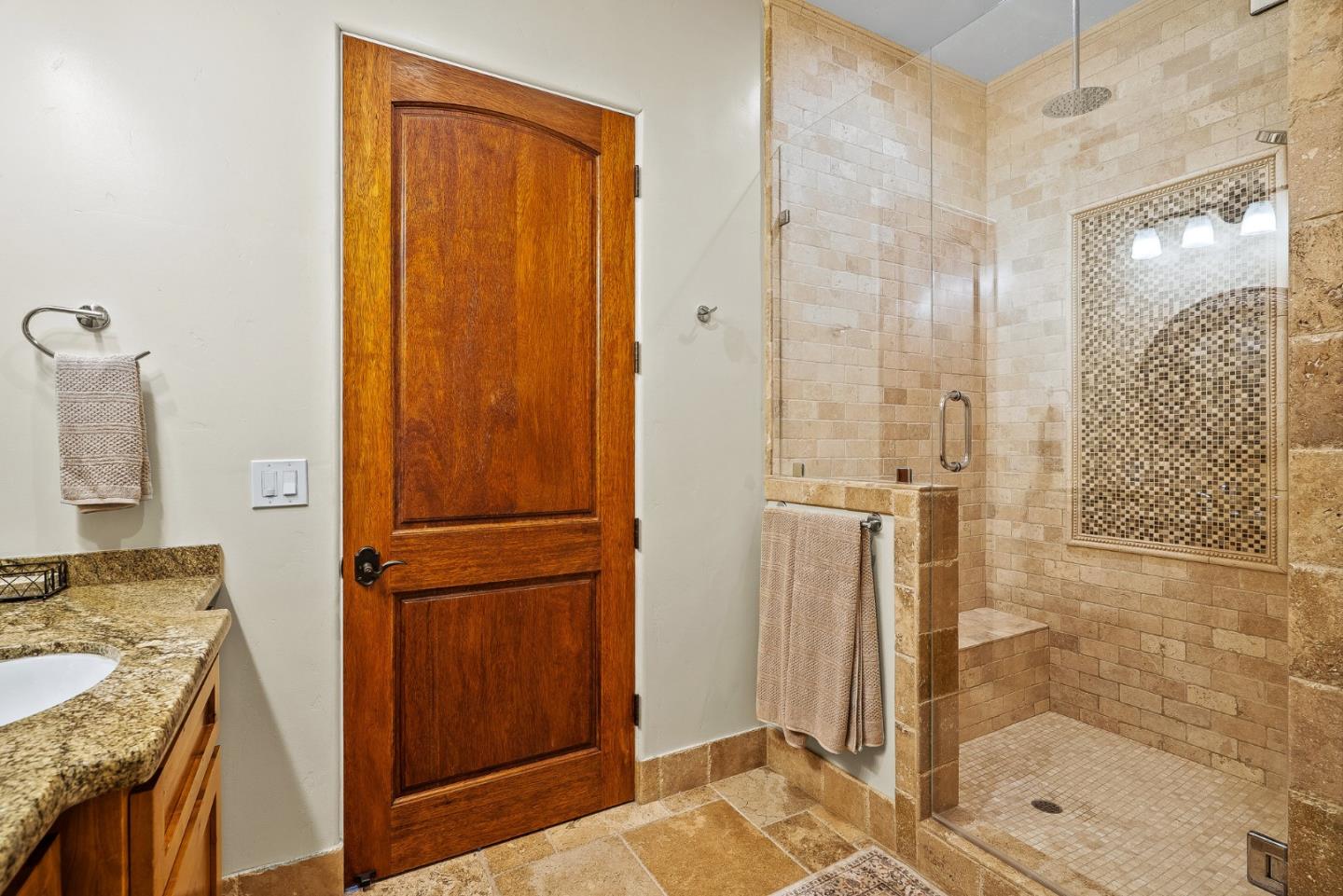 1405 Lakeview Court San Martin, CA 95046 - Photo 54 of 83 a bathroom with a granite countertop shower mirror and a sink