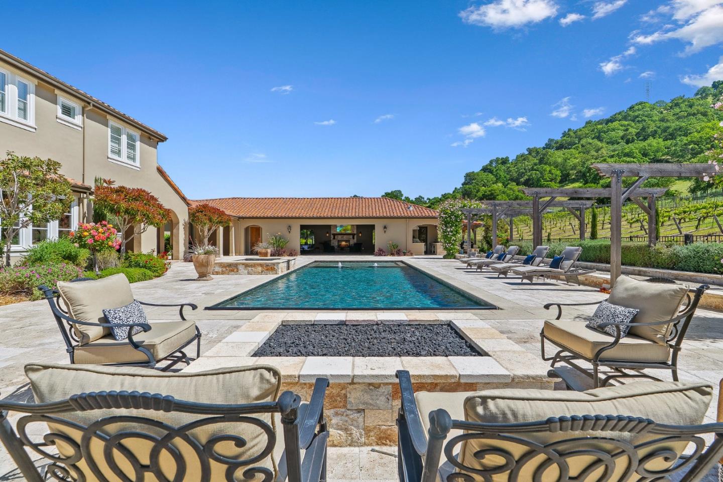 1405 Lakeview Court San Martin, CA 95046 - Photo 58 of 83 a view of a patio with couches table and chairs and potted plants