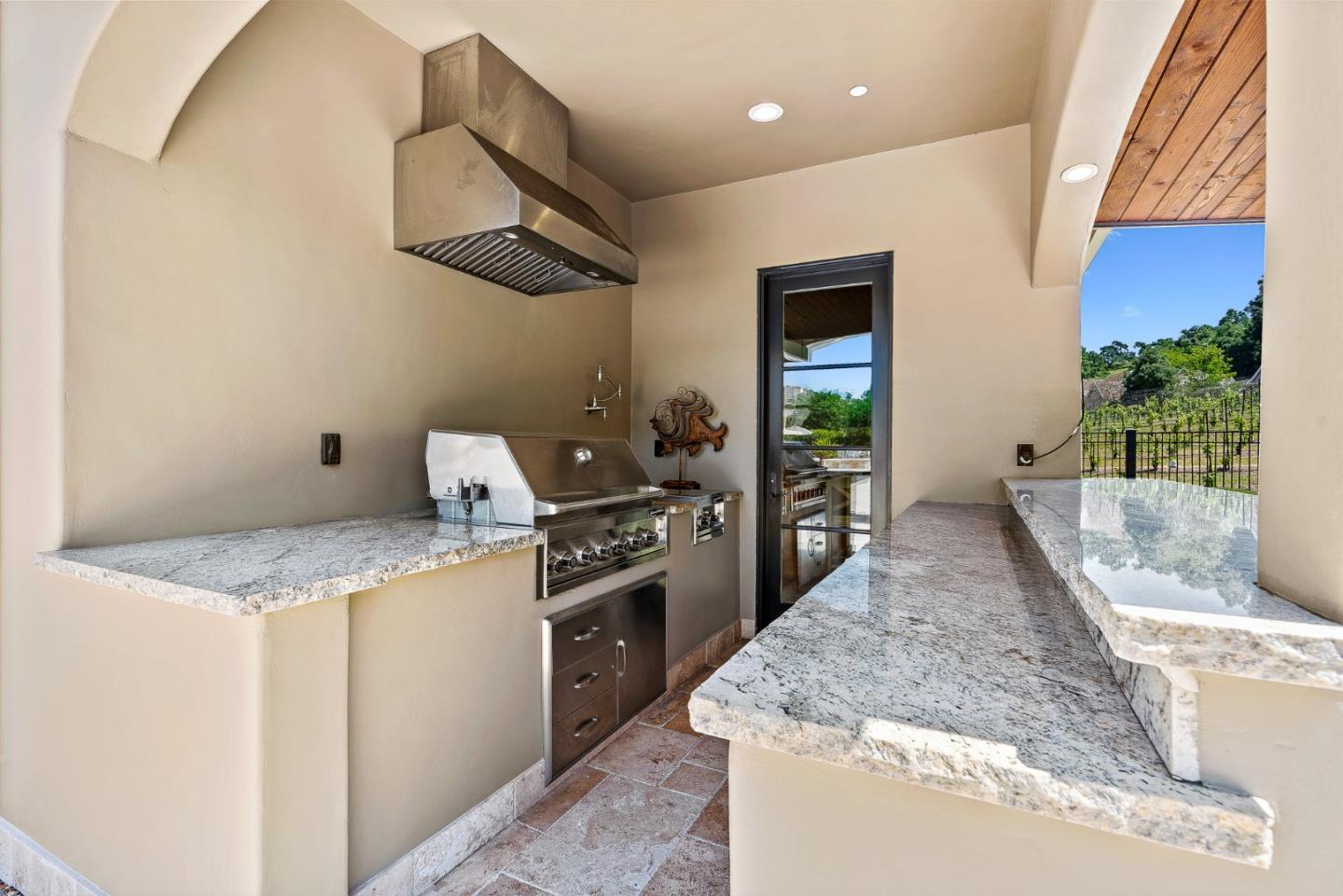 1405 Lakeview Court San Martin, CA 95046 - Photo 59 of 83 a kitchen with stainless steel appliances granite countertop a stove a sink and a refrigerator