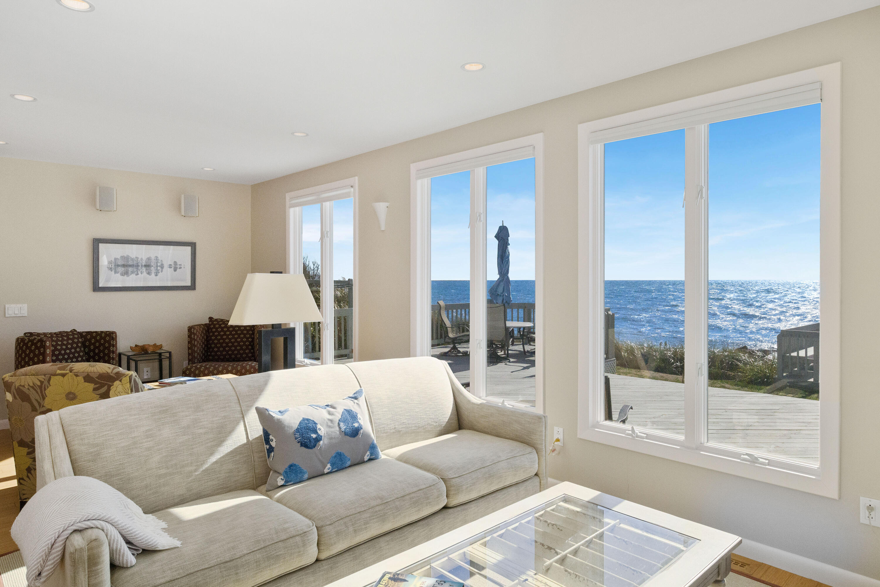 43 Shore Road West Harwich, MA 02671 - Photo 11 of 40 a living room with furniture and a large window