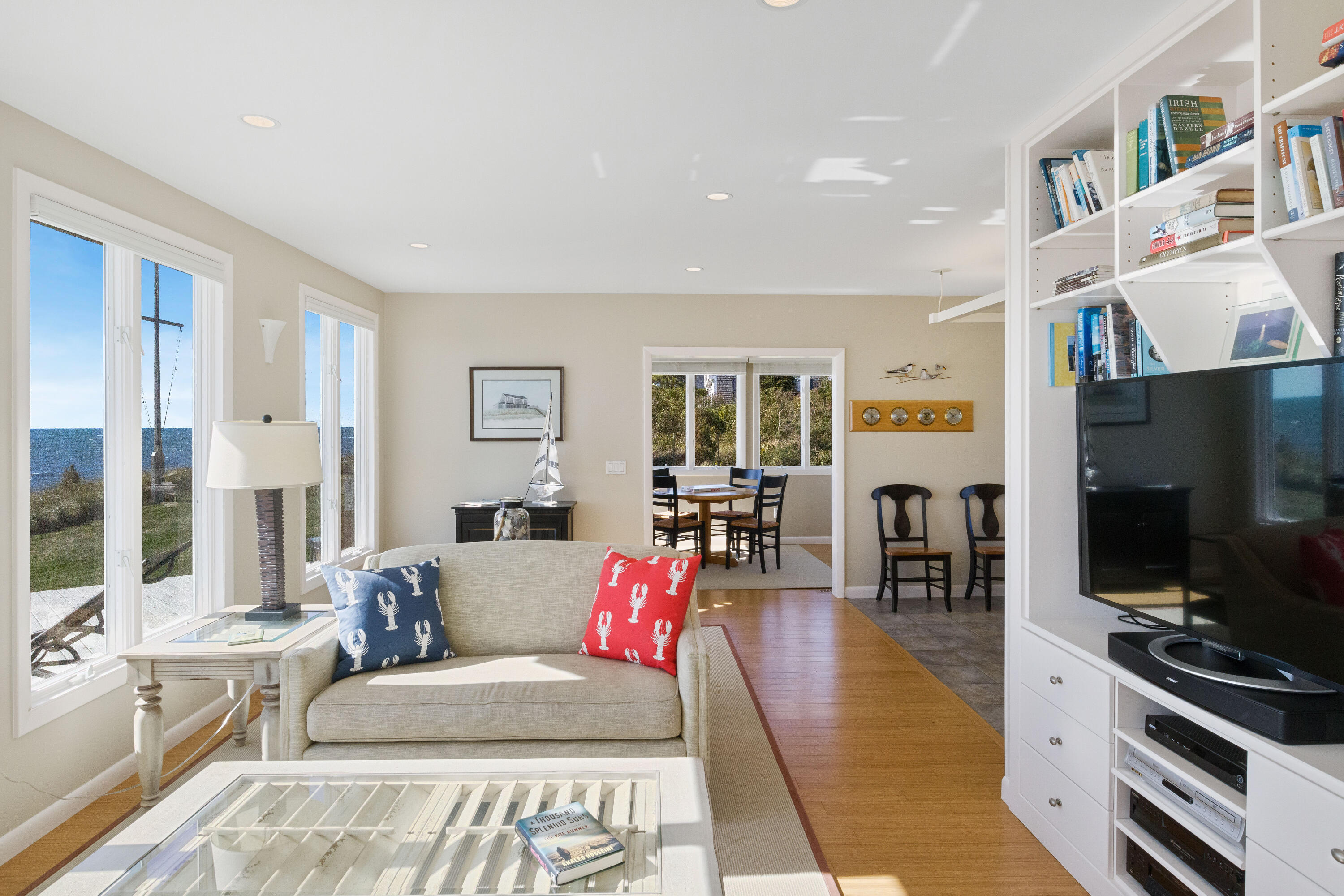 43 Shore Road West Harwich, MA 02671 - Photo 13 of 40 a living room with furniture and a flat screen tv