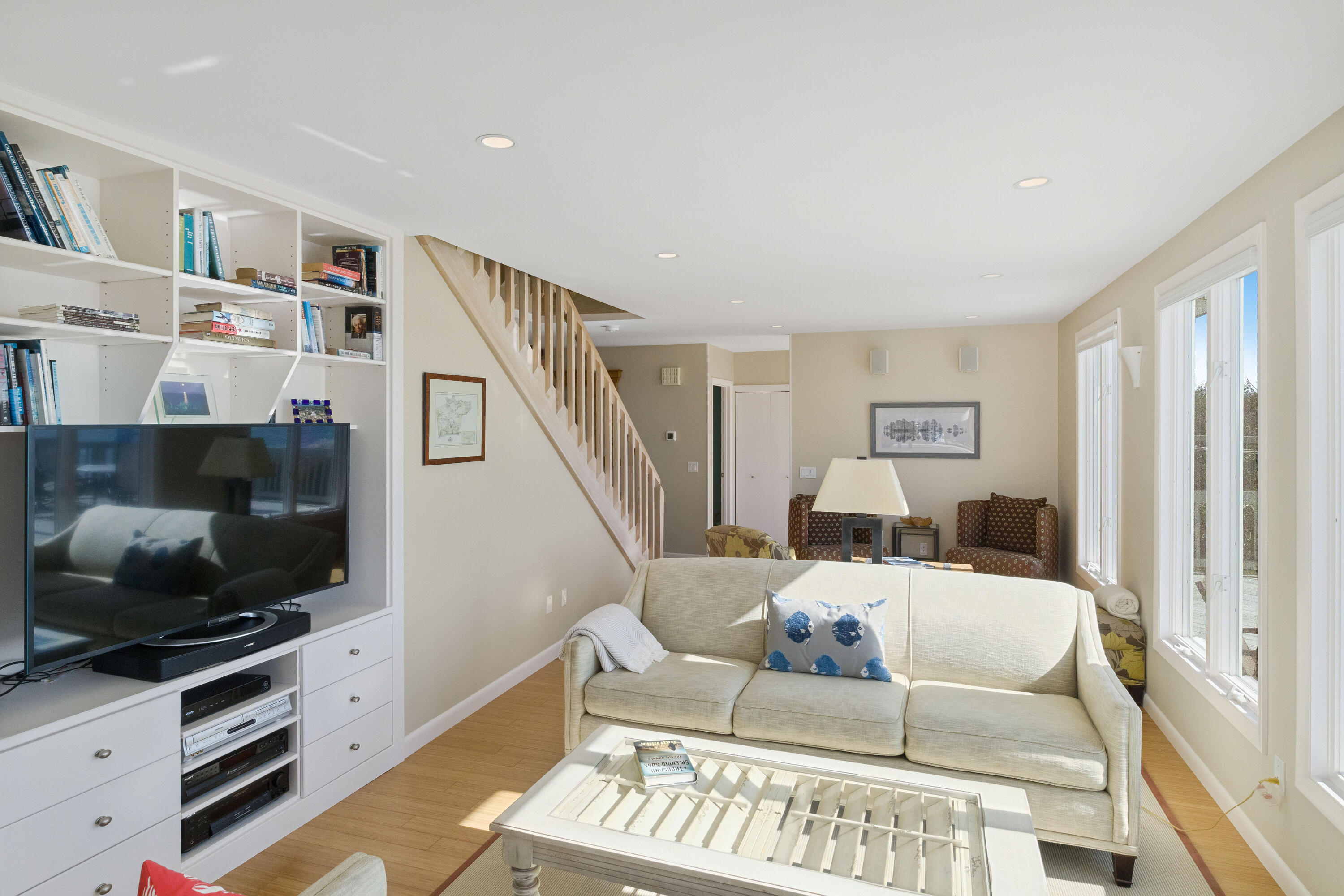 43 Shore Road West Harwich, MA 02671 - Photo 14 of 40 a living room with furniture and a flat screen tv