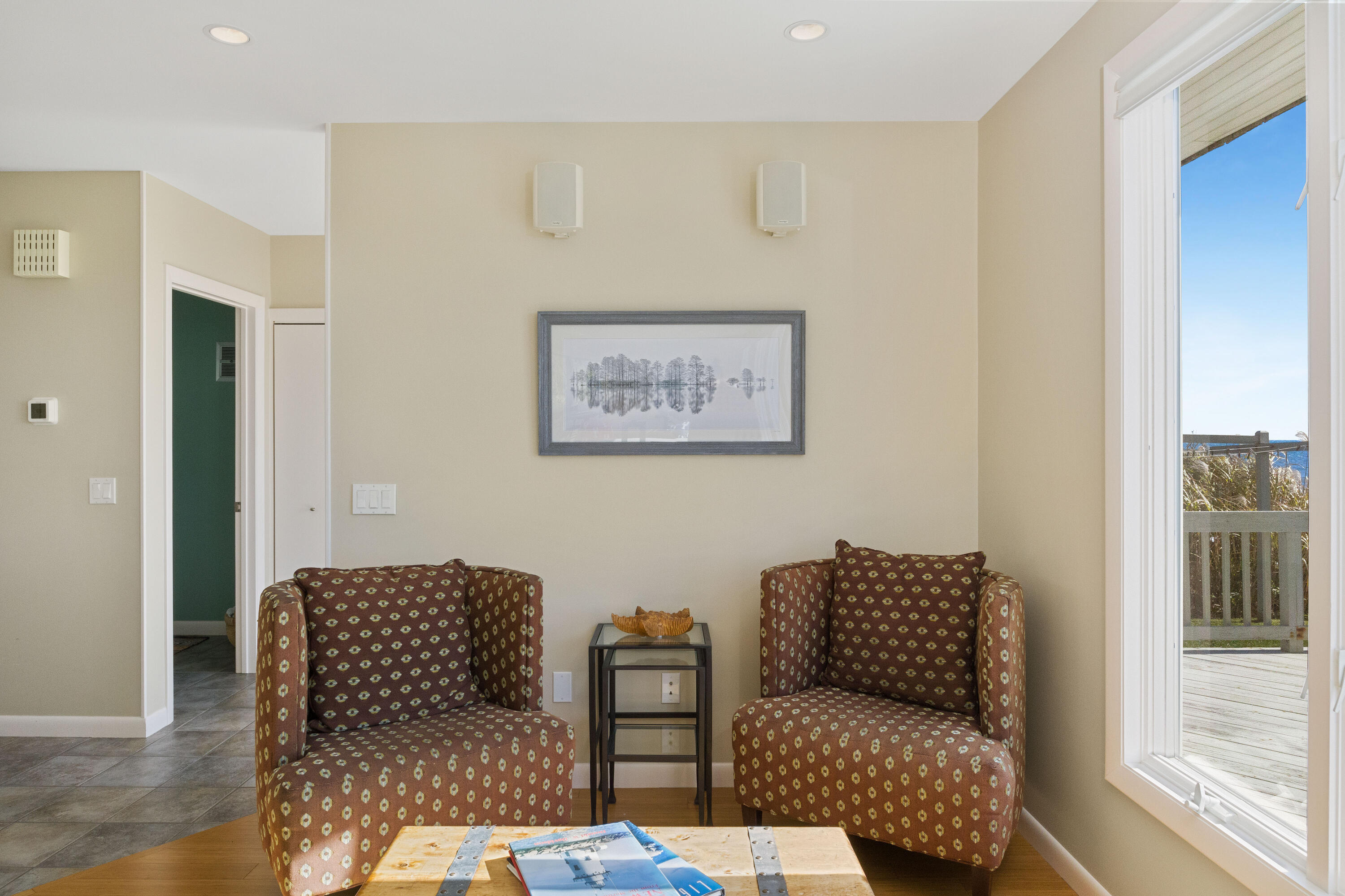 43 Shore Road West Harwich, MA 02671 - Photo 15 of 40 a living room with furniture and a window
