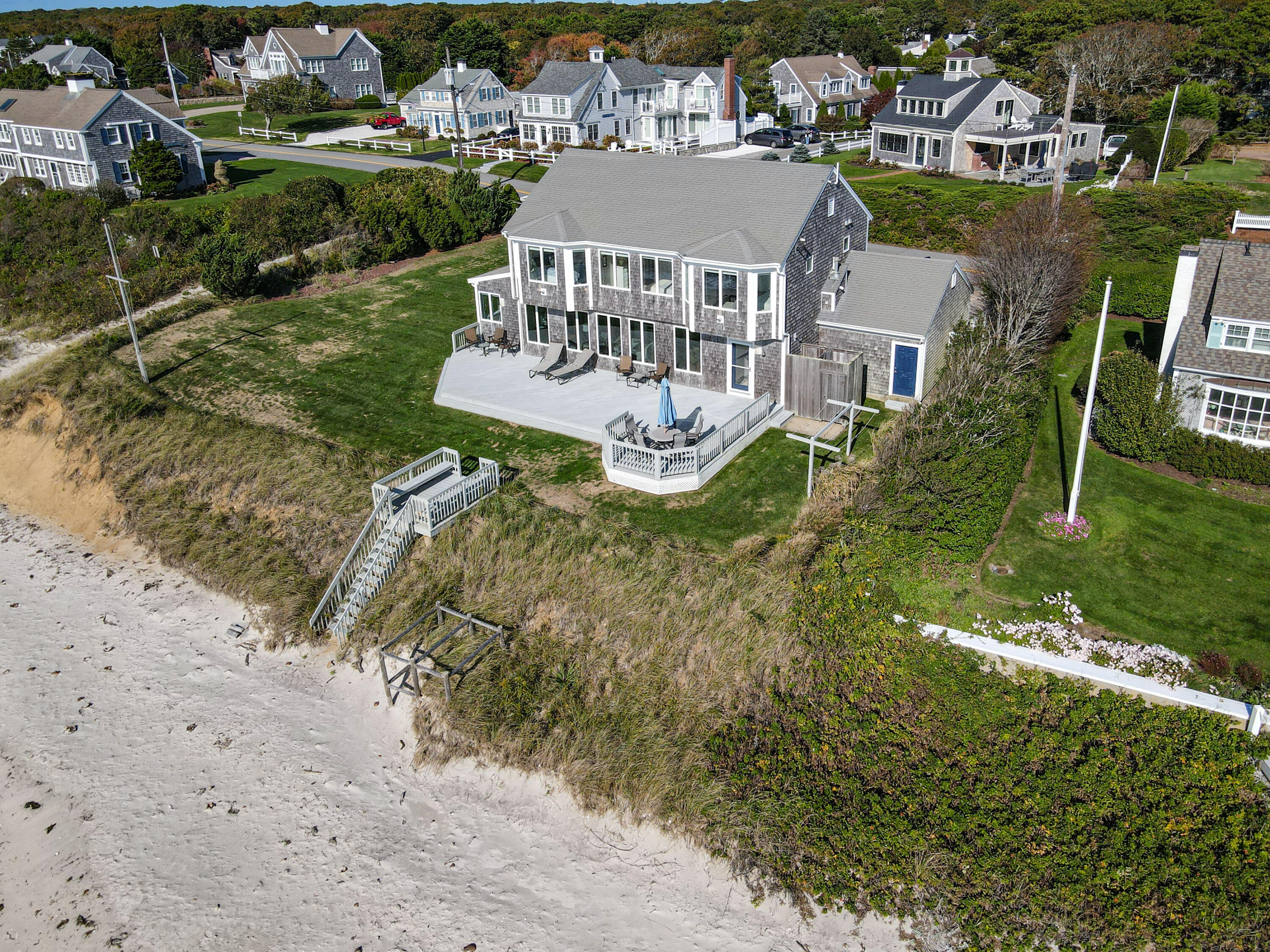 43 Shore Road West Harwich, MA 02671 - Photo 2 of 40 an aerial view of a house with a garden