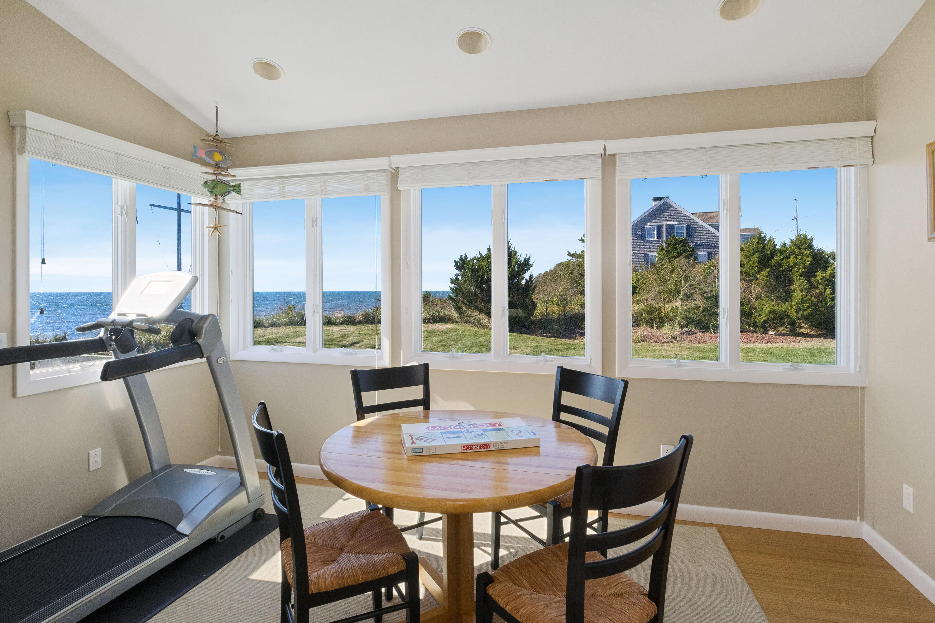 43 Shore Road West Harwich, MA 02671 - Photo 24 of 40 a view of a dining room with furniture window and outside view