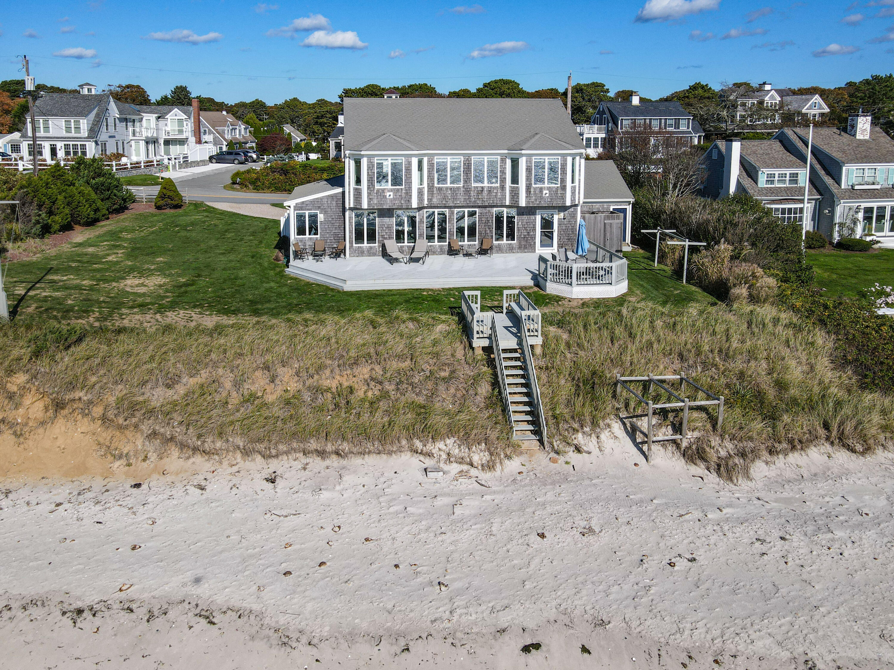 43 Shore Road West Harwich, MA 02671 - Photo 36 of 40 a view of a house with a yard from a balcony