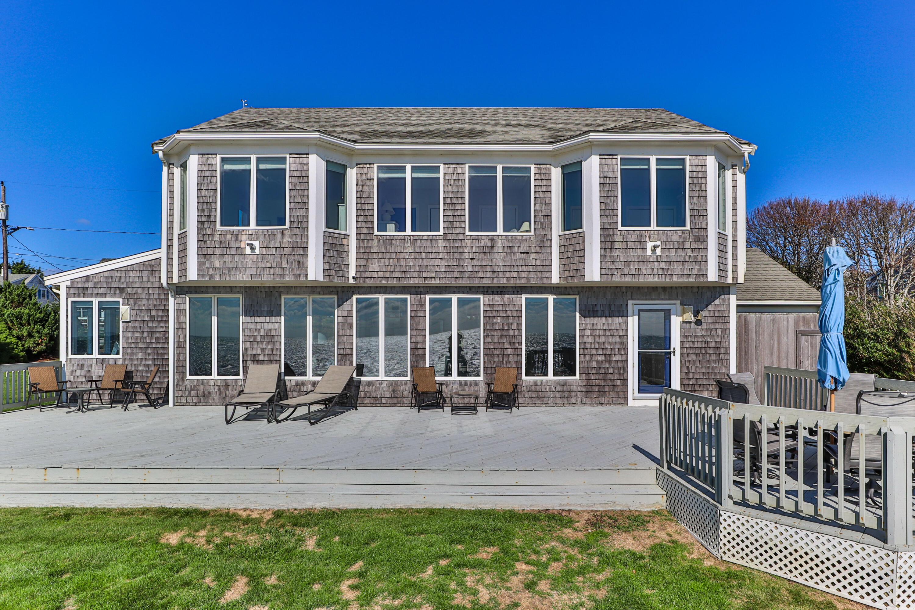 43 Shore Road West Harwich, MA 02671 - Photo 8 of 40 a front view of a house with a porch