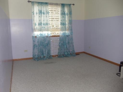 1607 Rose Court Romeoville, IL 60446 - Photo 12 of 15 a view of an empty room with a window