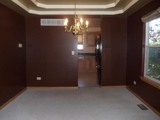 1607 Rose Court Romeoville, IL 60446 - Photo 3 of 15 a view of a chandelier in big room and chandelier