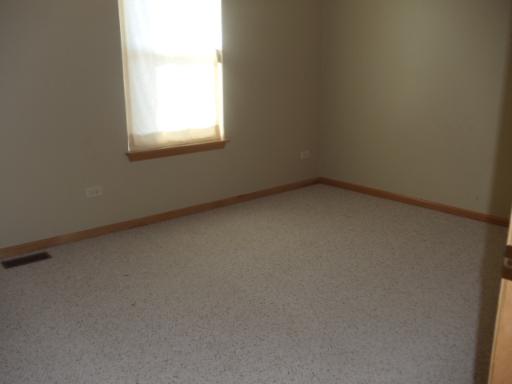 1607 Rose Court Romeoville, IL 60446 - Photo 10 of 15 an empty room with a window