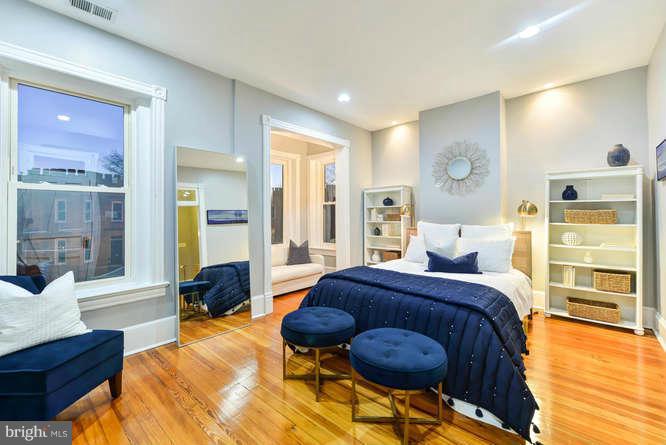 1319 T Street Northwest Washington, DC 20009 - Photo 12 of 25 a bedroom with a bed and balcony view