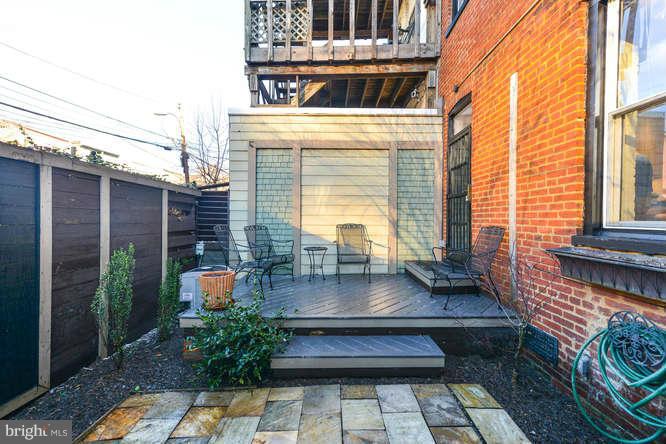 1319 T Street Northwest Washington, DC 20009 - Photo 22 of 25 a view of a building with outdoor seating area